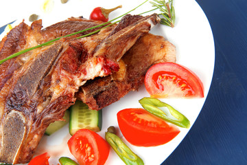 beef meat bone steak and tomatoes