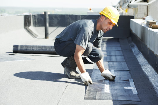 Flat Roof Covering Works With Roofing Felt