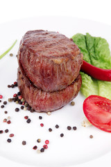 grilled beef fillet medallions on noodles