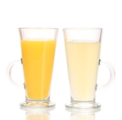 Tropical juices in glasses isolated on white