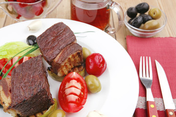 lamb garnished with tomatoes
