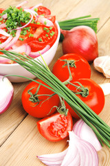fresh tomato salad in white bowl