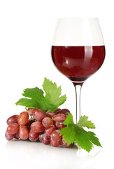 glass of wine and ripe grapes isolated on white