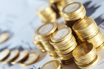 Business diagram on financial report with coins