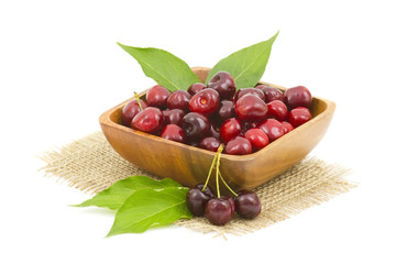 cherries in a wooden bowl