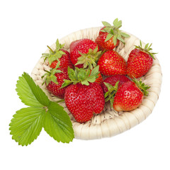 strawberries in a wicker basket leaf isolated on white backgroun