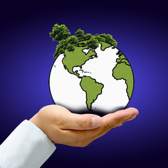 Earth with tree in hand