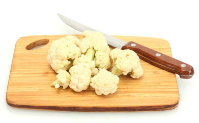 Fresh cauliflower and knife on cutting board isolated on white