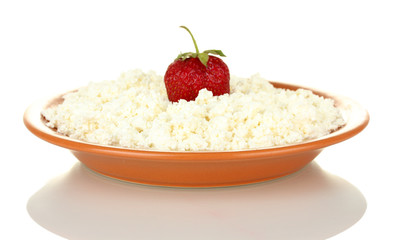 Cottage cheese with strawberry in a plate isolated on white