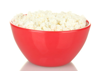 cottage cheese in red bowl isolated on white