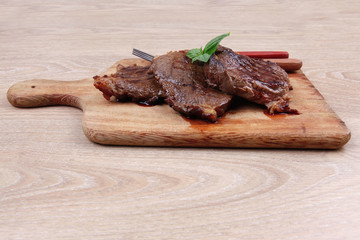 grilled beef on wood