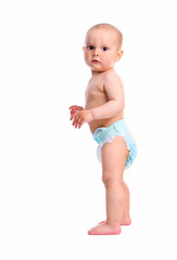 Full length portrait of a cute one-year old boy over white