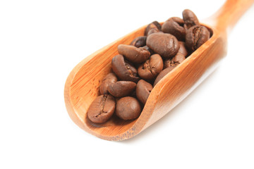 Café en grains et cuillère