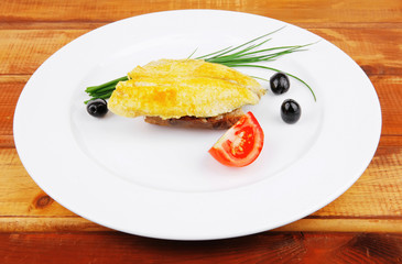 fish fillet with tomatoes,chives and bread