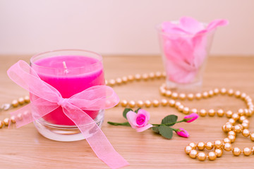 pink candles and petals for aromatherapy