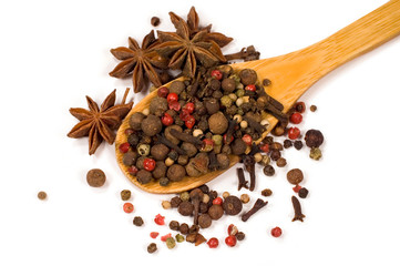 spices in a wooden spoon