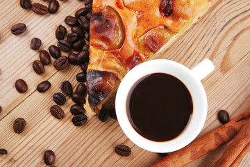 sweet round apple pie on wood with coffee cup