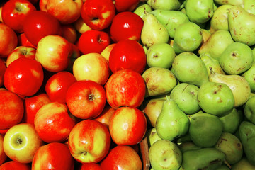 Naklejka na ściany i meble lot of apples and pears on counter