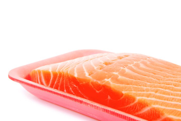 fresh raw salmon on tray