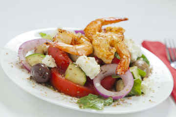 Greek salad with piri piri shrimps