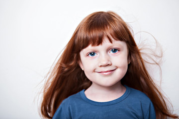 happy little girl  in studio