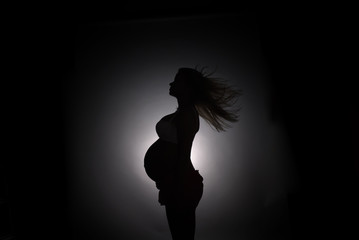 Fototapeta na wymiar Portrait of pregnant woman
