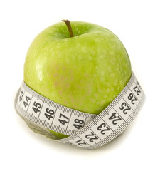 diet concept with measuring tape and apple
