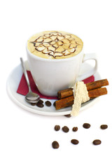 Coffee beans, cup and cinnamon