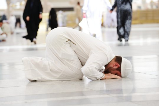 Muslim praying at Medina mosque