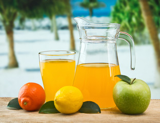 orange juice in a glass on a table