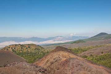The volcano Etna landscape in a blue sky