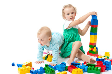 children play with blocks in studio