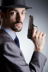 Businessman man with hand gun