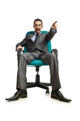 Businessman sitting in the chair on white