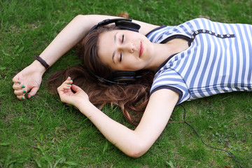 Woman lying on grass