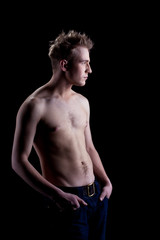 Fototapeta na wymiar Young man with naked torso