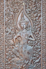 Angel woodcraft on temple door.