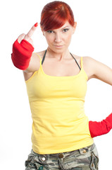 Sportive young woman in boxing bandage showing middle finger