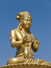 Fototapeta premium Golden buddha statue