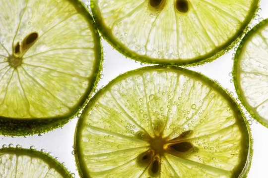 Lime slices floating in soda water