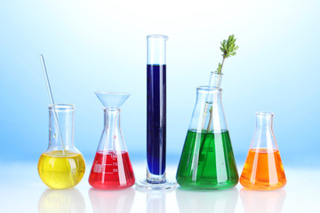 Different laboratory glassware with color liquid
