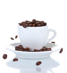 White cup with coffee beans isolated on white