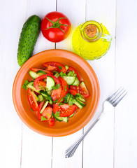 Fresh salad with tomatoes and cucumbers