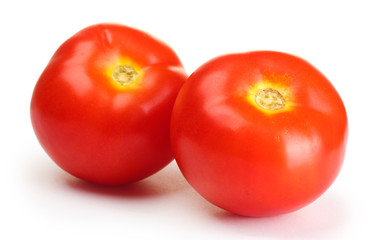 Ripe red tomatoes isolated on white