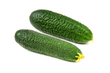 Two cucumbers on white background