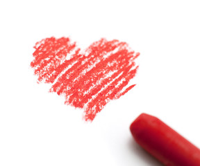 coeur dessiné et sa craie rouge