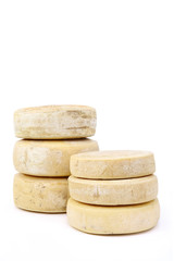 various forms of cheese on white background