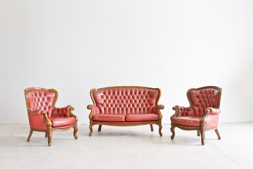 vintage luxury armchair in white room