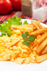 Scrambled egg with french fries