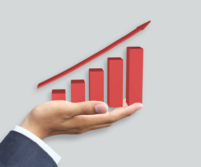 Hand holding growth graph